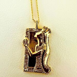 BaubleBar gold, The Empress tarot card medallion necklace.